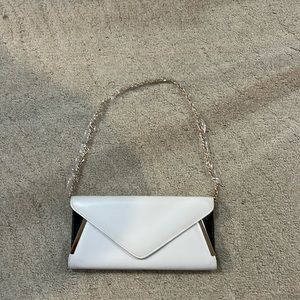 Aldo white, black and gold clutch never used - new